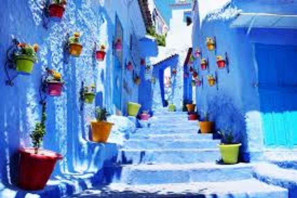 Chefchaouen, or Chauen, is a city located in the Rif Mountains in northwestern Morocco. It is known for the spectacular blue buildings of different shades in its old town, as well as its steep cobbled streets lined with looms and leather shops.